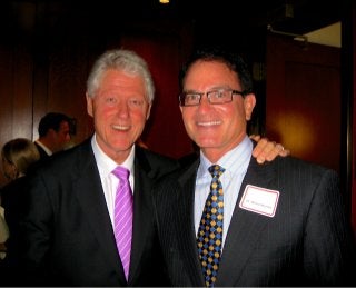 Photo of Gilead Founder Michael L. Riordan and President Bill Clinton