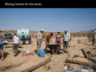 Mixing cement for the posts.