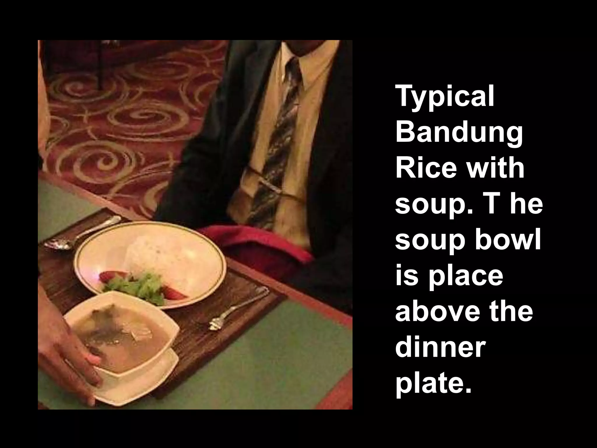 Typical  Bandung Rice with soup. T he soup bowl is place above the dinner plate.