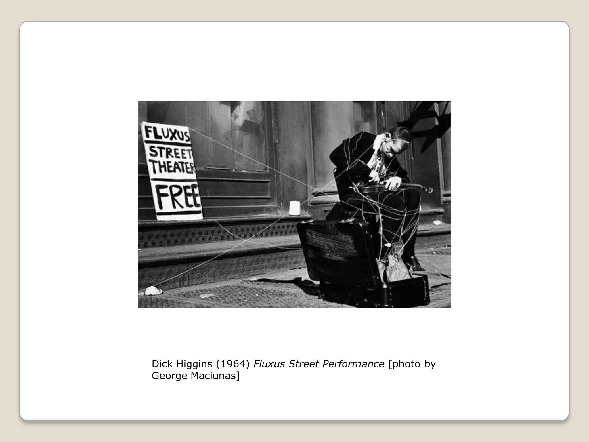 Dick Higgins (1964) Fluxus Street Performance [photo by George Maciunas]