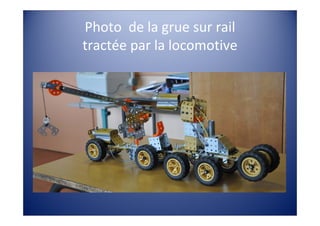 Photo  de la grue sur rail 
tractée par la locomotive
 