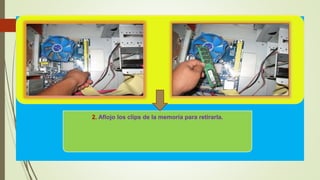 2. Aflojo los clips de la memoria para retirarla.
 