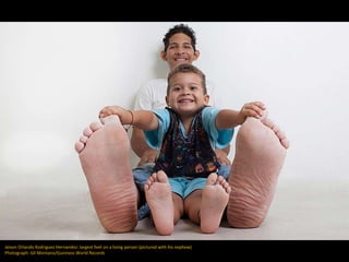 Jeison Orlando Rodriguez Hernandez: largest feet on a living person (pictured with his nephew)
Photograph: Gil Montano/Guinness World Records
 