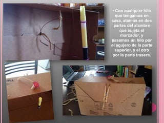 • Con cualquier hilo
que tengamos en
casa, atamos en dos
partes del alambre
que sujeta el
marcador, y
pasamos un hilo por
el agujero de la parte
superior, y el otro
por la parte trasera.
 
