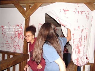 A tour guide opens a
entry way to lead the
crowd to safety.

 