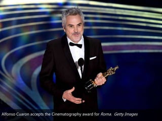 Alfonso Cuaron accepts the Cinematography award for Roma. Getty Images
 