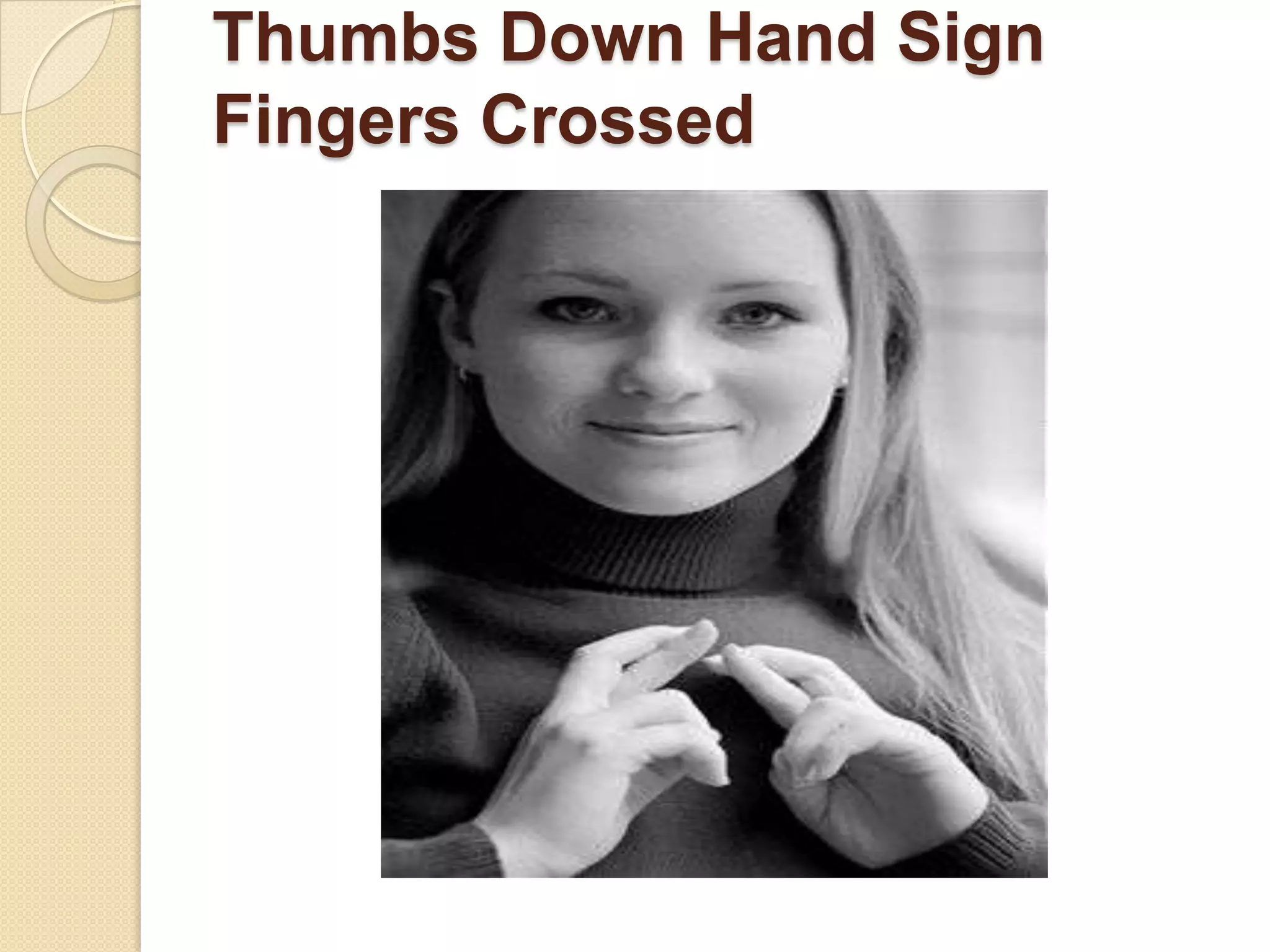 Thumbs Down Hand Sign
Fingers Crossed
 