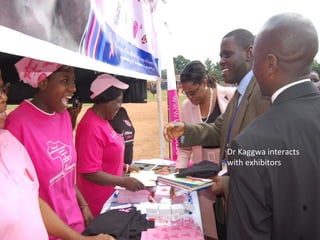 Dr Kaggwa interacts
with exhibitors
 