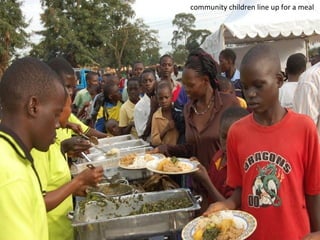 community children line up for a meal
 