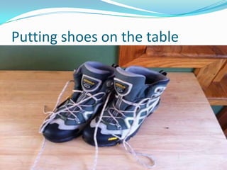 Putting shoes on the table