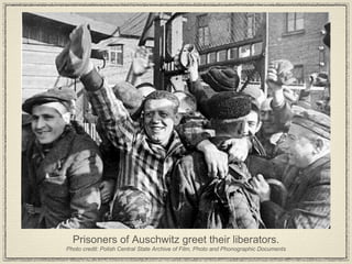 Prisoners of Auschwitz greet their liberators. Photo credit: Polish Central State Archive of Film, Photo and Phonographic Documents 