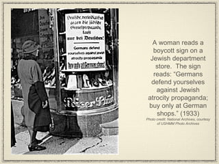 A woman reads a boycott sign on a Jewish department store.  The sign reads: “Germans defend yourselves against Jewish atrocity propaganda; buy only at German shops.” (1933) Photo credit: National Archives, courtesy of USHMM Photo Archives 