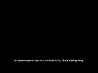 Pro-Democracy Protesters and Riot Police Clash in Hong Kong 
 