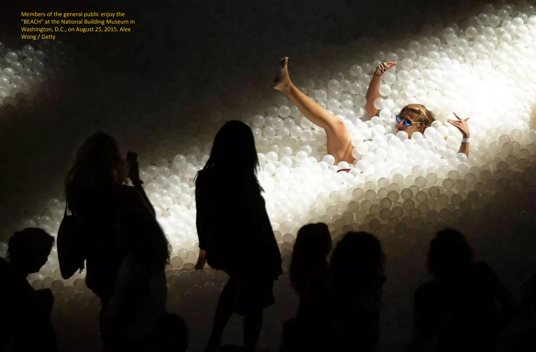 Members of the general public enjoy the
"BEACH" at the National Building Museum in
Washington, D.C., on August 25, 2015. Alex
Wong / Getty
 
