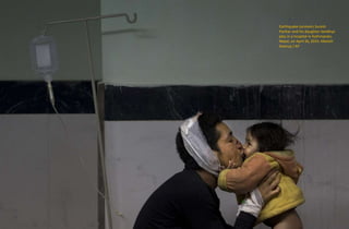 Earthquake survivors Suresh
Parihar and his daughter Sandhya
play in a hospital in Kathmandu,
Nepal, on April 26, 2015. Manish
Swarup / AP
 