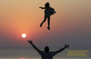 A man throws a girl into the air during sunset as
they spend time on the territory of Chersonesus
Tavrichesky (Tauric Chersonesos) National
Reserve in the Black Sea port of Sevastopol,
Crimea, on July 25, 2015. Pavel Rebrov / Reuters
 