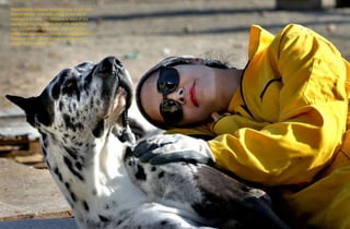 Homa Rashid, a lawyer and volunteer at the Vafa
Animal Shelter, rests with a dog, in the city of
Hashtgerd 43 miles (73 kilometers) west of the
capital Tehran, Iran. More than 500 dogs find
care and affection at the Vafa Animal Shelter,
which was established through an endowment in
2004 and is the country’s only licensed animal
refuge. Vahid Salemi / AP
 