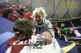Alabama quarterback Jake Coker embraces his
delighted mother Michelle Spires after the
second half of the Southeastern Conference
championship NCAA college football game
against Florida on December 5, 2015, in
Atlanta. Alabama won 29-15. David Goldman /
AP
 