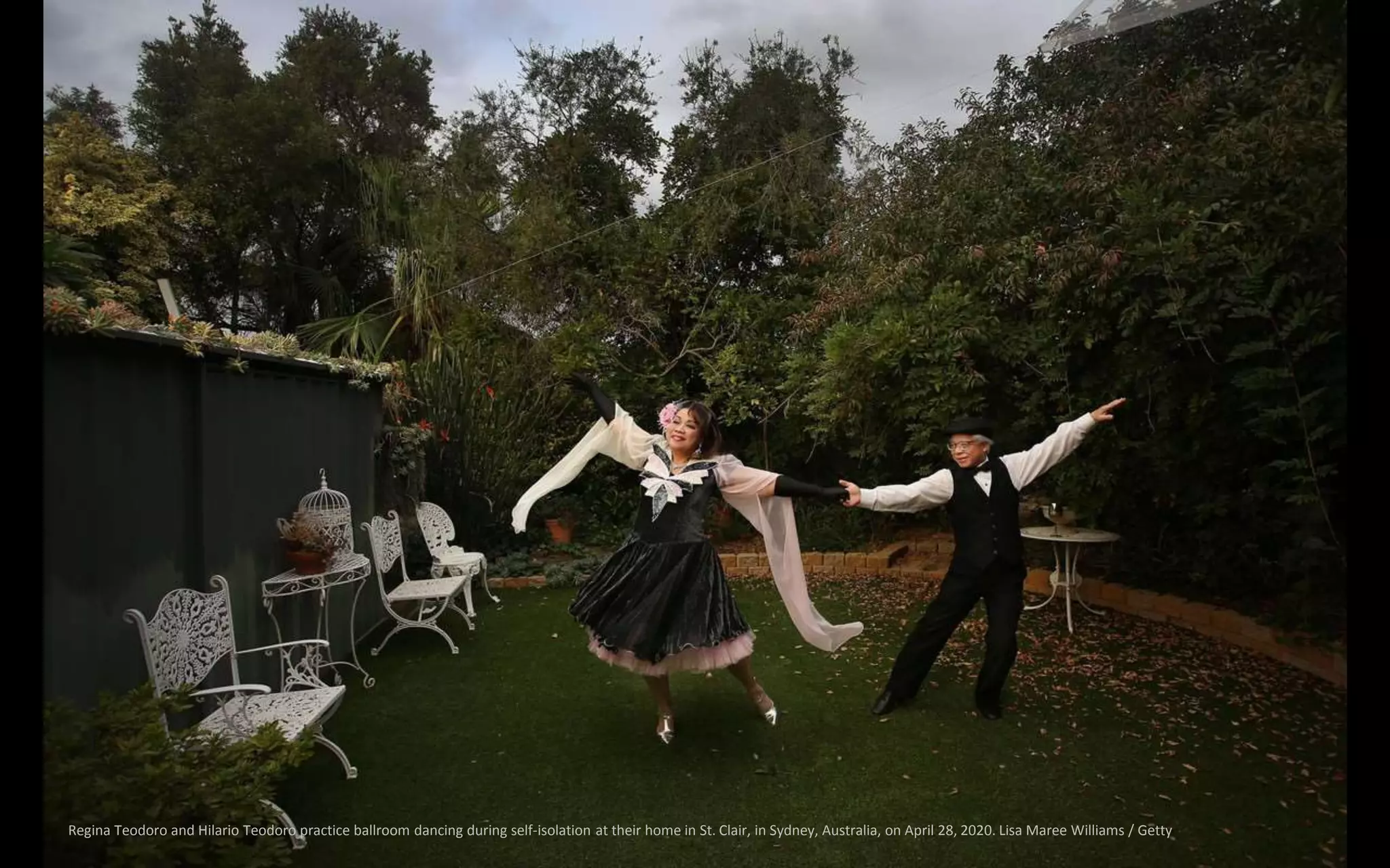 Regina Teodoro and Hilario Teodoro practice ballroom dancing during self-isolation at their home in St. Clair, in Sydney, Australia, on April 28, 2020. Lisa Maree Williams / Getty
 