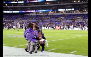 Mark Ingram II of the Baltimore Ravens hugs his daughters before the AFC Divisional Playoff game against the
Tennessee Tit...