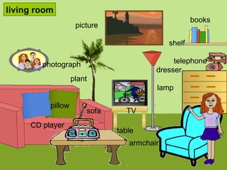 lamp TV telephone picture CD player pillow shelf books sofa armchair photograph living room table plant dresser 