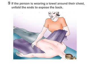 9 If the person is wearing a towel around their chest,
unfold the ends to expose the back.

 