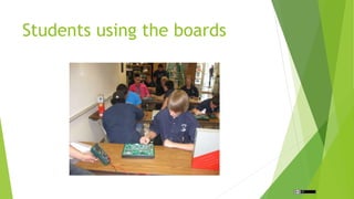 Students using the boards