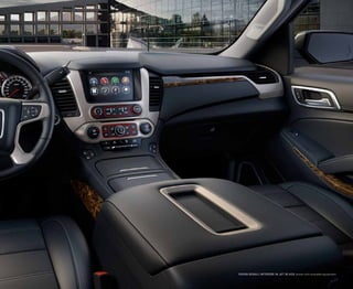 yukon denali interior in jet black shown with available equipment.
 