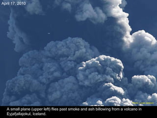 A small plane (upper left) flies past smoke and ash billowing from a volcano in Eyjafjallajokul, Iceland. April 17, 2010 Photo: Lucas Jackson  