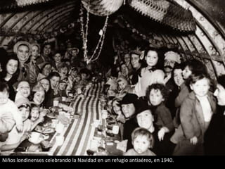 Niños londinenses celebrando la Navidad en un refugio antiaéreo, en 1940.

 
