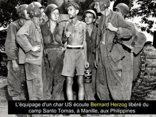 L'équipage d'un char US écoute Bernard Herzog libéré du
camp Santo Tomas, à Manille, aux Philippines
 