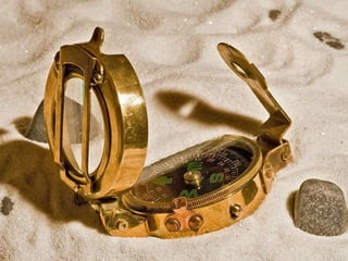 Compass in Sand 