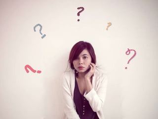 Girl and Question Marks 