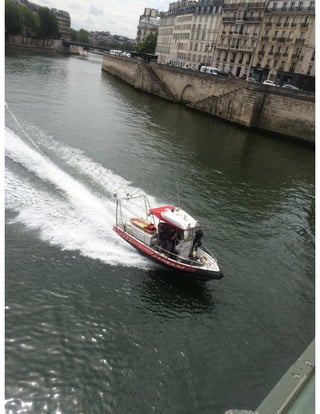 Police Boat Speeding Down the Siene