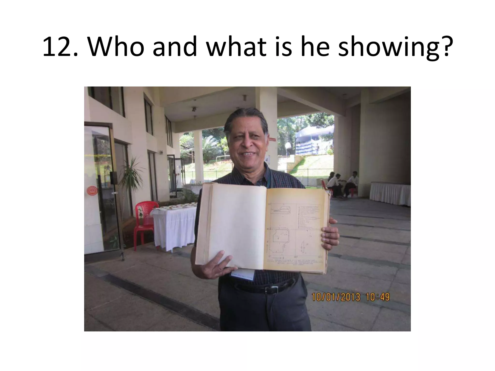 12. Who and what is he showing?
 