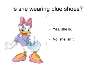 Is she wearing blue shoes? Yes, she is. No, she isn´t.  