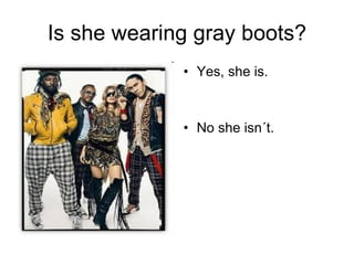 Is she wearing gray boots? Yes, she is. No she isn´t. 