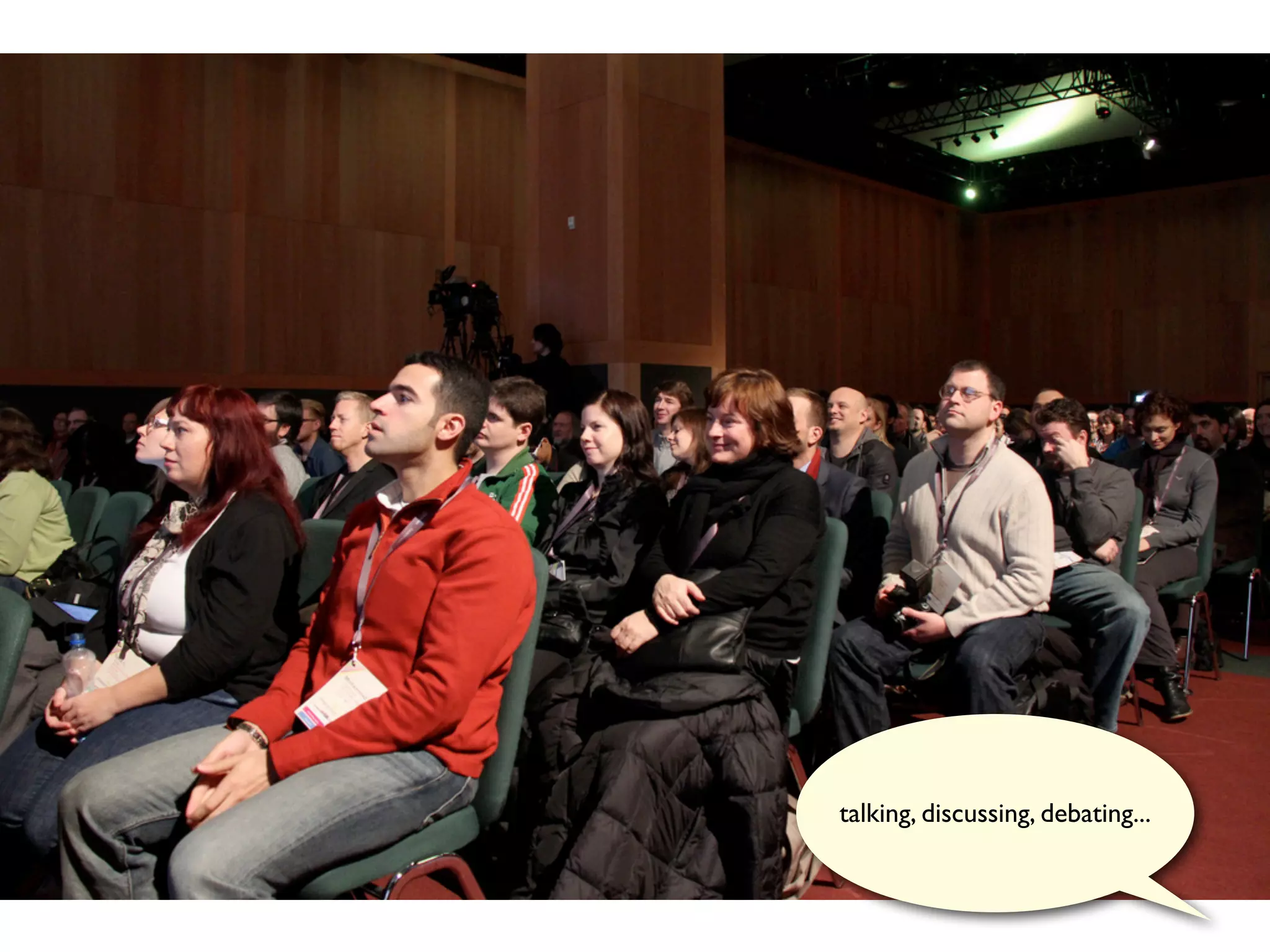 talking, discussing, debating...
 