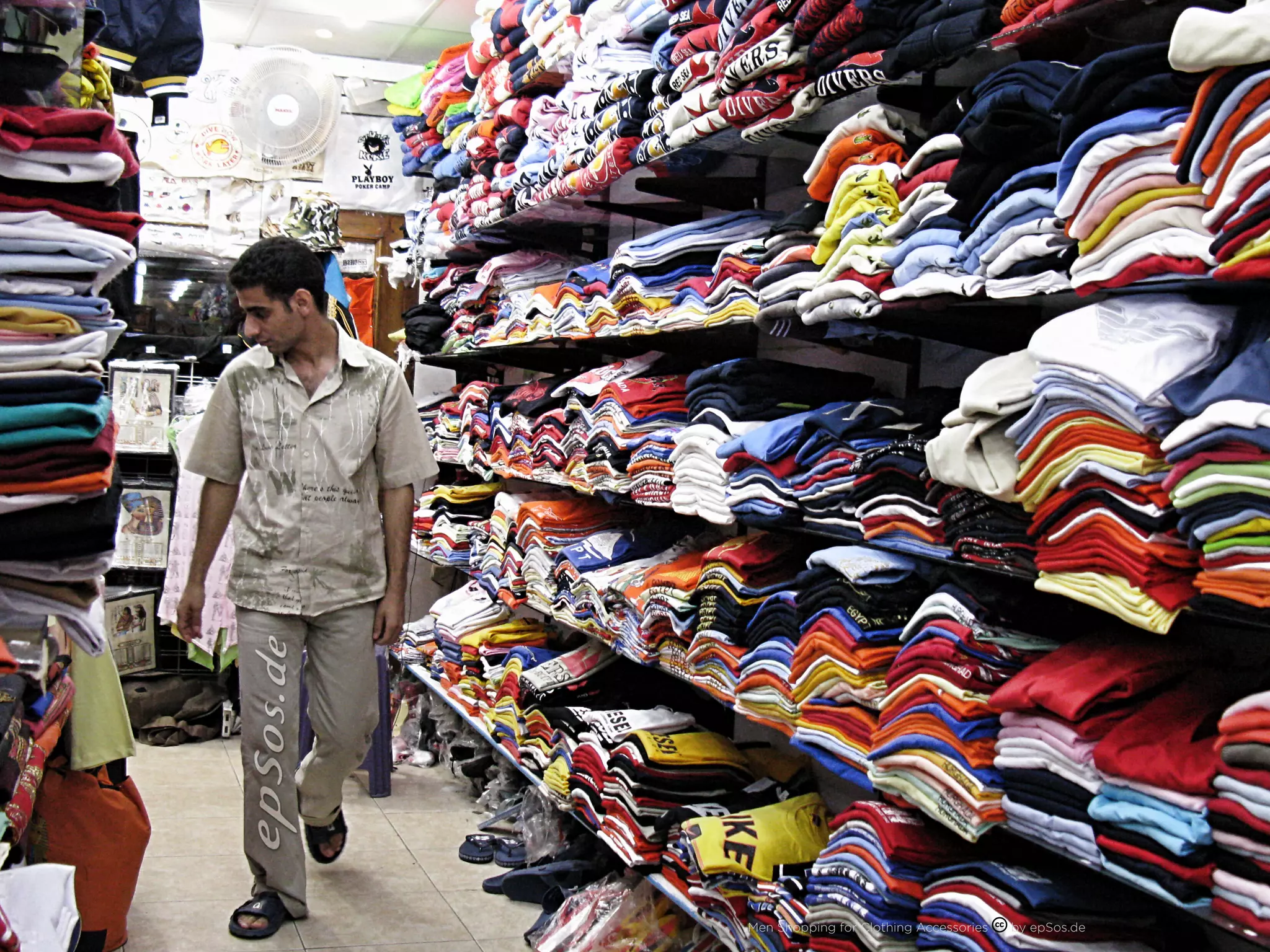 Men Shopping for Clothing Accessories   by epSos.de
 