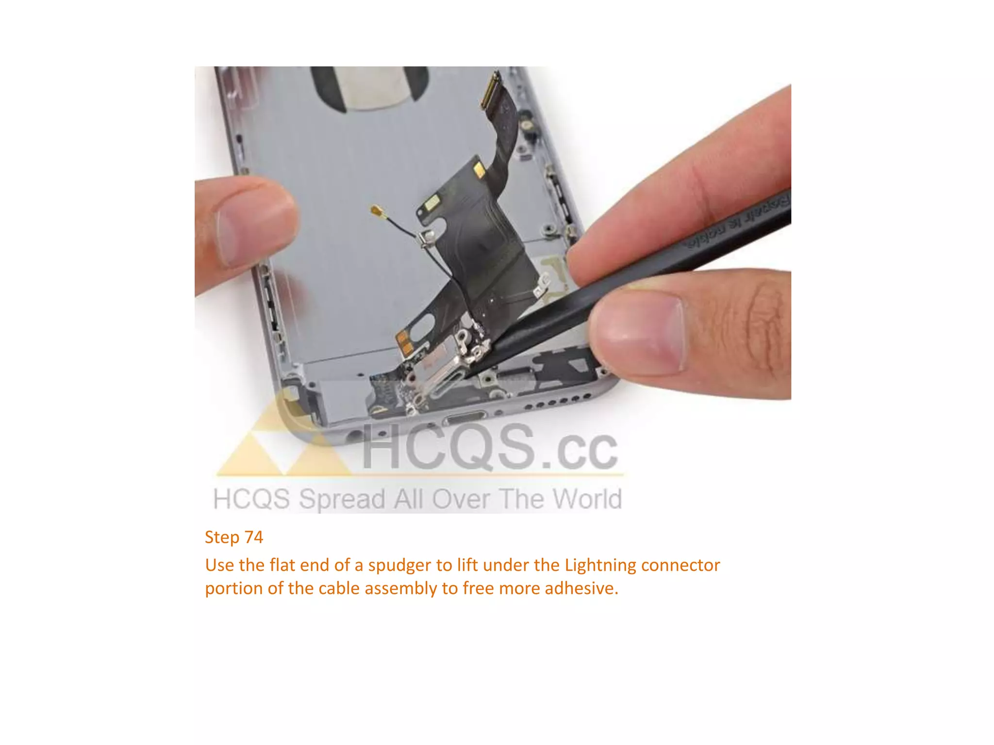 Step 74
Use the flat end of a spudger to lift under the Lightning connector
portion of the cable assembly to free more adhesive.
 