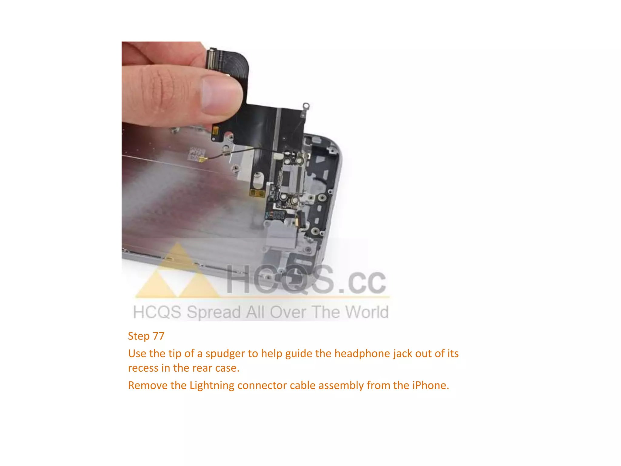 Step 77
Use the tip of a spudger to help guide the headphone jack out of its
recess in the rear case.
Remove the Lightning connector cable assembly from the iPhone.
 