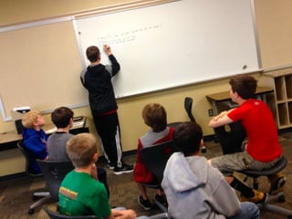  Students Brainstorm 10 ways to get the ball
in the bucket
 Show photo of students brainstorming
 Show list of ideas they created
 