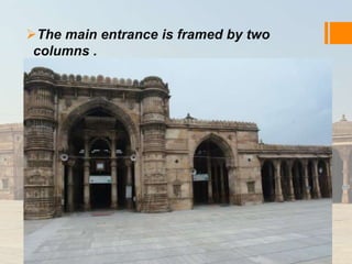 The main entrance is framed by two 
columns . 
 