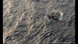 13 March 2011: A house is seen adrift in the Pacific Ocean off SendaiUS Navy/Reuters
 