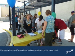 Margaret Vimont and Tammy Dean welcome employees to the grand event.
 