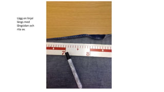 Lägg en linjal
längs med
långsidan och
rita av.
 