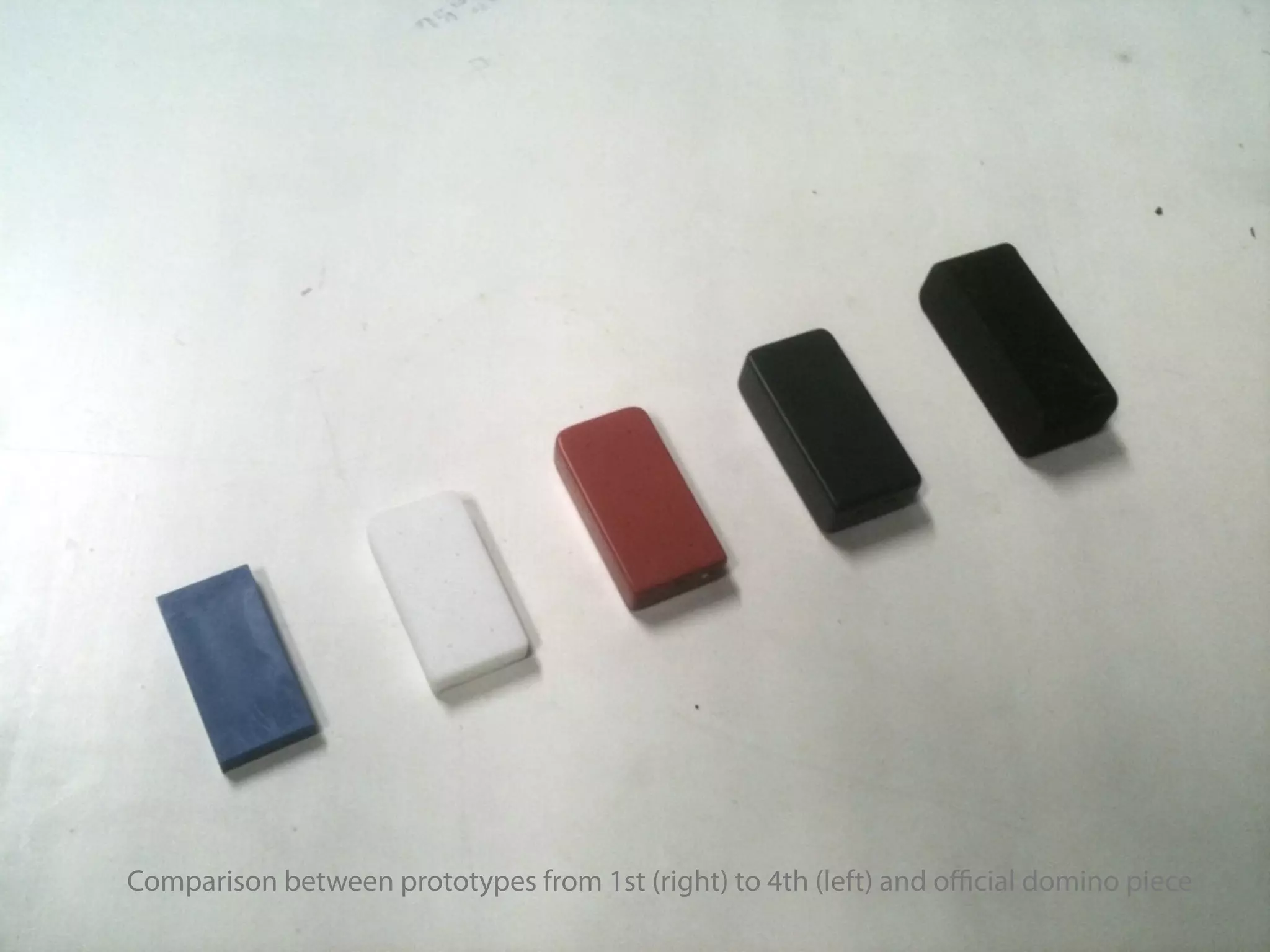 Comparison between prototypes from 1st (right) to 4th (left) and oﬃcial domino piece
 