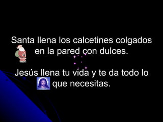 Santa llena los calcetines colgados en la pared con dulces.   Jesús llena tu vida y te da todo lo que necesitas. 