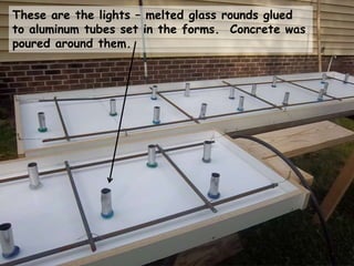 These are the lights – melted glass rounds glued
to aluminum tubes set in the forms. Concrete was
poured around them.
 