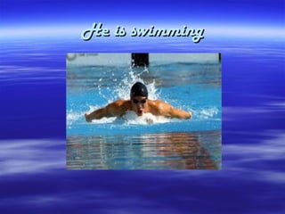 He is swimming
 